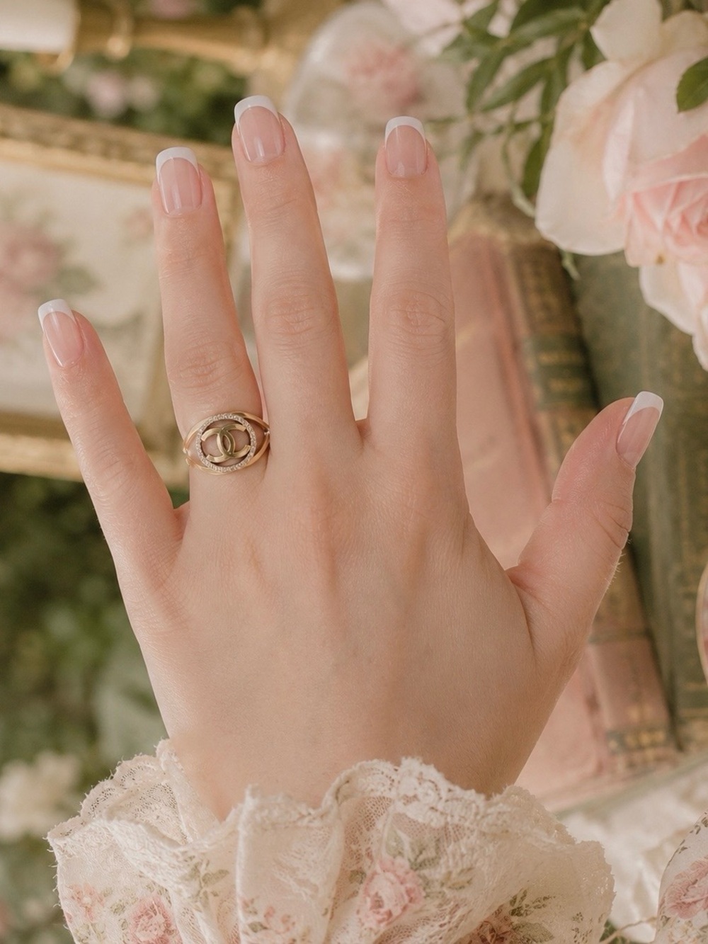 CHANEL gold double interlocking CC ring